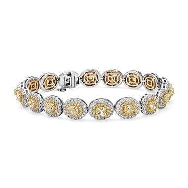 Fancy yellow diamond halo bracelet set in 18K white and yellow gold at Blue Nile 