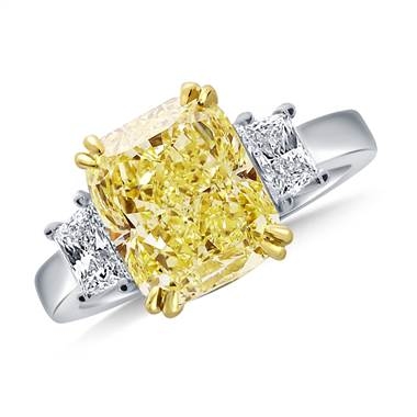 Fancy yellow cushion cut diamond three stone ring set in 18K white gold at B2C Jewels 