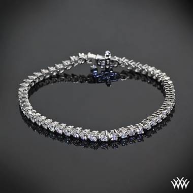 Pair with: Three prong diamond tennis bracelet set in 14K white gold at Whiteflash 