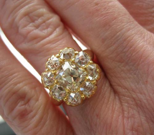 Kaleigh's heirloom ring with antique cushion diamonds