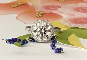 Loreal's 2.61 ct double edge Halo ring Loreal's 2.61 ct double edge Halo ring