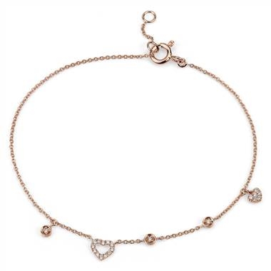 Mini diamond asymmetrical heart bracelet set in 14K rose gold at Blue Nile 