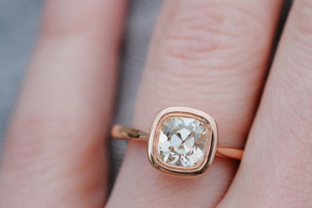 Rose gold bezel ring with 'August Vintage' Cushion diamond • Image by DorotheaBrooke