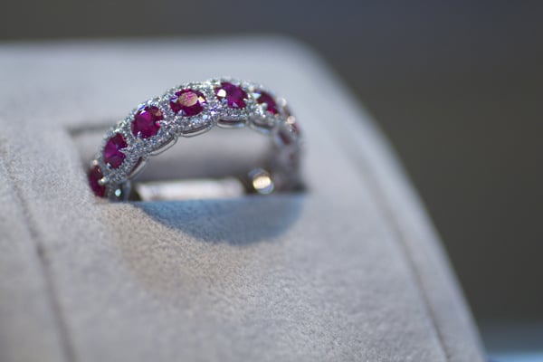 Omi Privé Platinum Guild Award winning design, shown with rubies