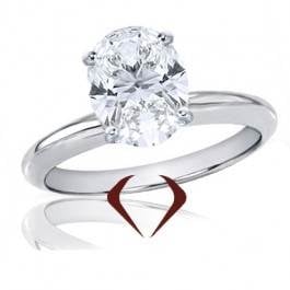 Oval diamond solitaire ring set in 14K white gold at I.D. Jewelry (