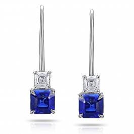 Asscher cut blue sapphire earrings set in 18K white gold at I.D. Jewelry 