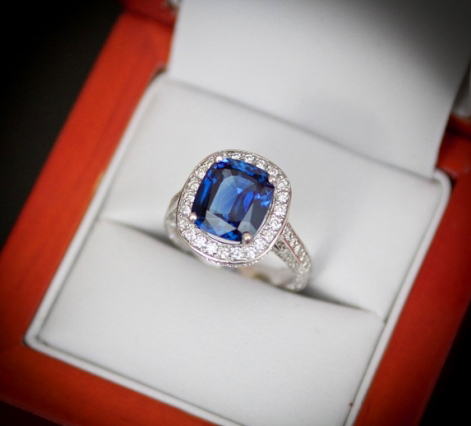 Sapphire engagement ring with diamond a halo