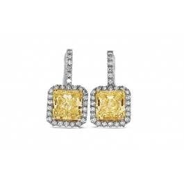 Radiant cut yellow diamond earrings set in 18K white gold at I.D Jewelry 