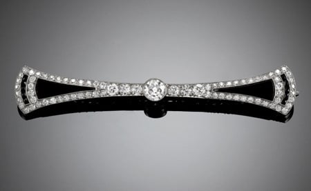 Art Deco Tiffany & Co. onyx and diamond bow brooch
