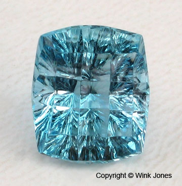 Concave faceted Aquamarine Concave faceted Aquamarine