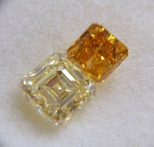 Fancy vivid yellow orange diamond with .93ct fancy light yellow diamond.