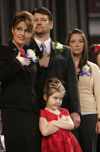 Palin%20Family%20hand%20over%20heart.JPG