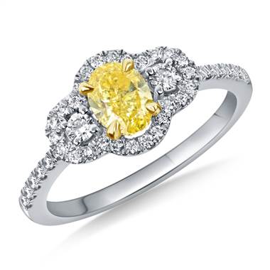 Fancy Intense Yellow Oval Cut Diamond Halo Ring Crafted in 18K Two Tone Gold(1 1/10 cttw.)