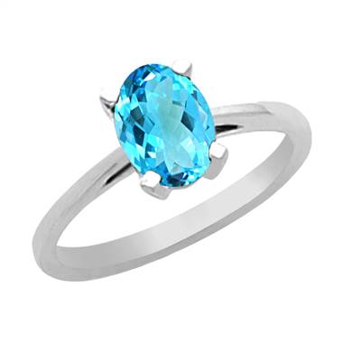 Genuine Blue Topaz and 14K White Gold Solitaire Ring (7x5mm)