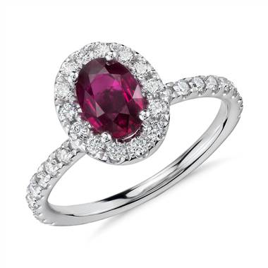 Oval Ruby and Diamond Halo Ring in 14k White Gold (7x5mm)