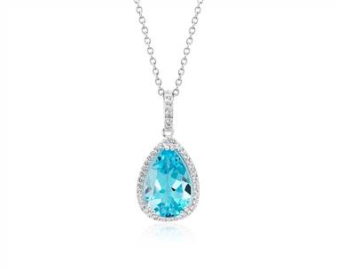 Sky Blue Topaz Elegant Halo Pendant Necklace In Sterling Silver (14X9mm)