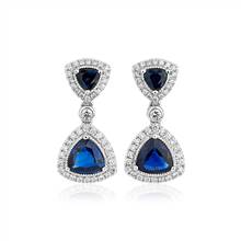 "Trilliant Blue Sapphire with Diamond Halo Earrings in 18k White Gold" | Blue Nile