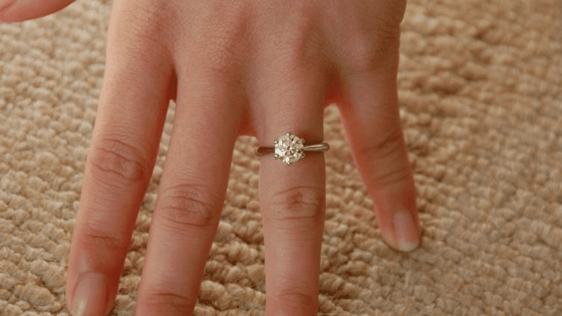 Hand crafted six prong solitaire diamond ring.