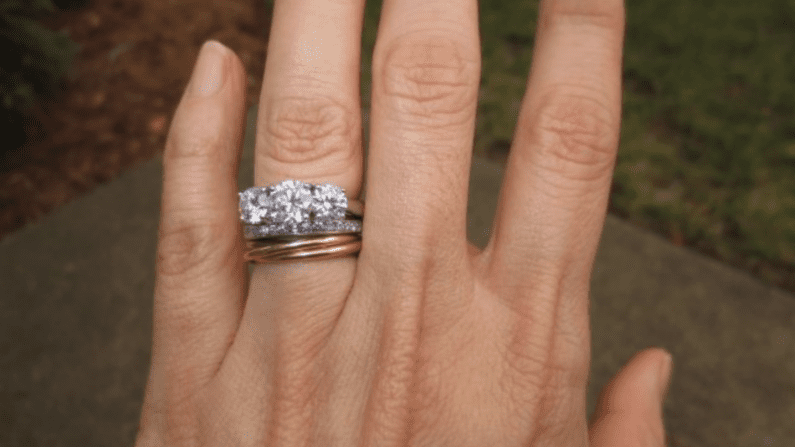 Three-stone diamond ring.