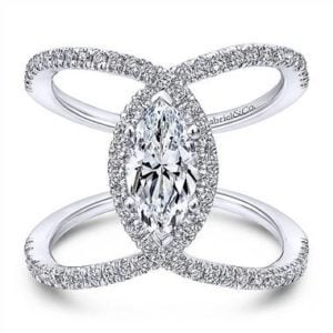 Diamond halo engagement ring set in 14K white gold at Gabriel & Co 