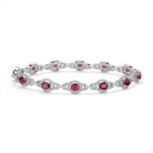 Ruby and diamond halo bracelet set in 14K white gold at Blue Nile 