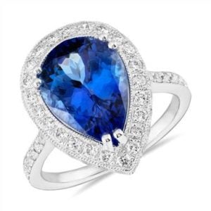 Pear-shaped tanzanite and diamond halo cocktail ring set in 18K white gold at Blue Nile 