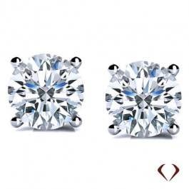 Round diamond stud earrings set in 14K white gold at I.D. Jewelry