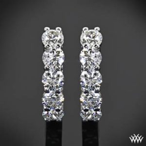 Soulmate Pairing: White gold “shared-prong” diamond hoop earrings set in 18K white gold at Whiteflash 