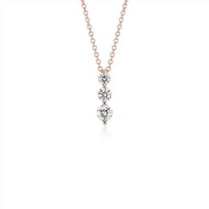 Grab the three-stone drop diamond pendant set in 18K rose gold at Blue Nile