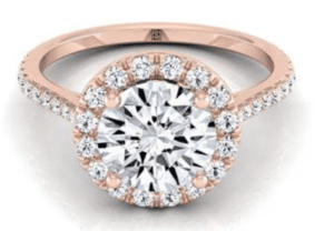 Diamond round halo engagement ring set in 14K rose gold at RockHer 