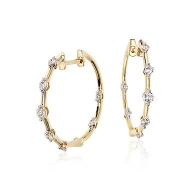 Studio diamond hoop earrings set in 18K yellow gold at Blue Nile 