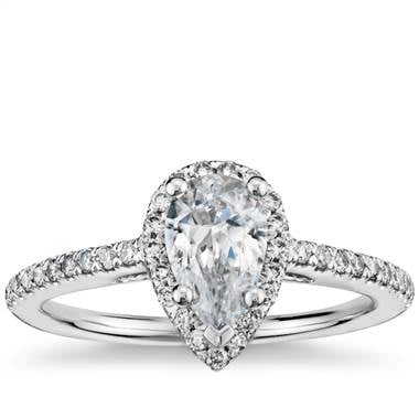 Pear shaped halo diamond engagement ring set in 14K white gold at Blue Nile 