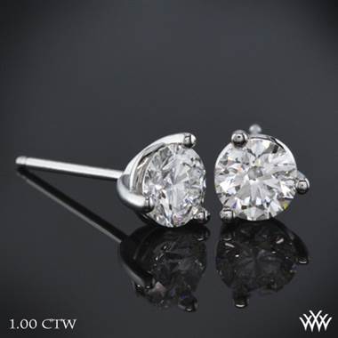 Three prong martini diamond earrings set in platinum at Whiteflash 