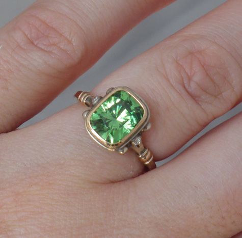 Tsavvy originally posted this delectable tsavorite ring on the Show Me the Bling Forum at PriceScope. Is this not the perfect look for spring!? That delicate green, sparkling with yellow and blues, with rose gold accents. Gorgeous!