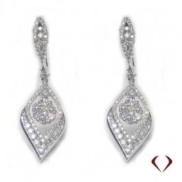 Steal her style: Give your daytime wardrobe a punch with these drop earrings. Diamond hanging earrings set in 18K white gold at I.D. Jewelry 