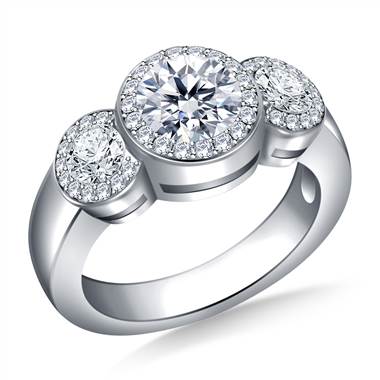 Three stone halo diamond engagement ring set in platinum at B2C Jewels 