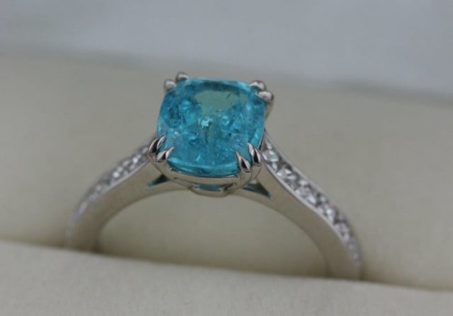 Acinom originally posted her enchanting Paraiba tourmaline ring on the Show Me the Bling forum at PriceScope. Taking inspiration from the Caribbean Sea, Acinom set out to create a ring that would transport her to the crystalline waves at a glance, and I’d say she achieved that and more!