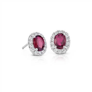 Oval ruby and pave diamond earrings set in 14K white gold at Blue Nile