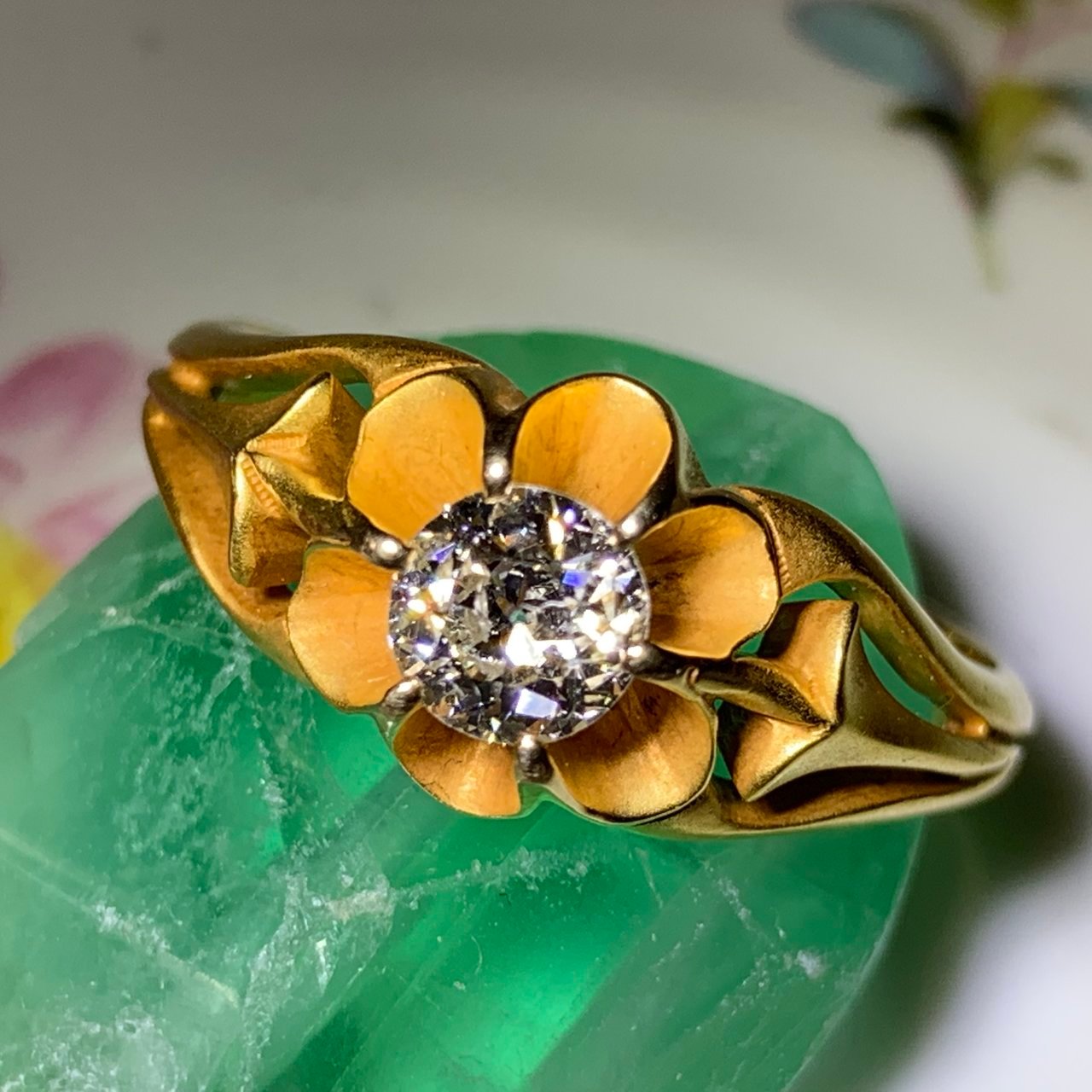 PreRaphaelite posted this beautiful buttercup set diamond ring on the Show Me the Bling forum at PriceScope. Buttercup settings really are a lovely way to make the stone the star! This OEC looks phenomenal seated inside the golden flower!