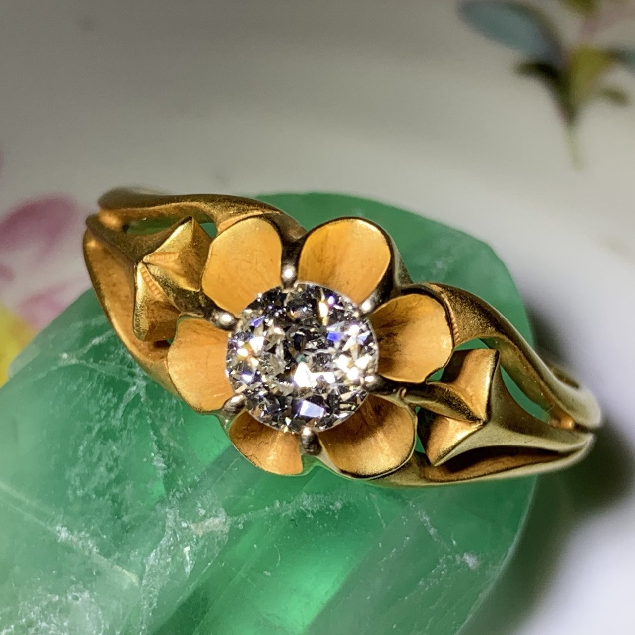 PreRaphaelite posted this beautiful buttercup set diamond ring on the Show Me the Bling forum at PriceScope. Buttercup settings really are a lovely way to make the stone the star! This OEC looks phenomenal seated inside the golden flower!