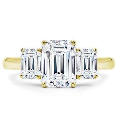 Emerald cut three stone engagement ring setting at Adiamor