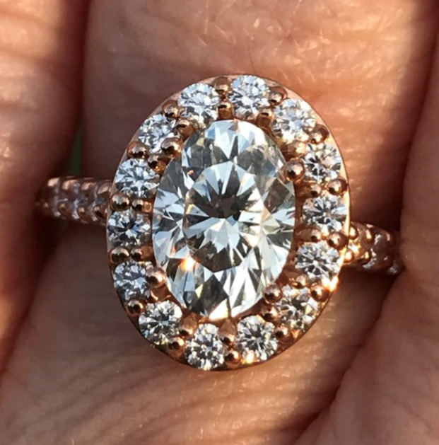 Sunshine 812 posted this incredible oval halo ring on the Show Me the Bling forum at PriceScope.  The light play on this ring is phenomenal, the contrast between the diamonds and that rose gold is beautiful. Ovals can be tricky, but this one is a knock out!
