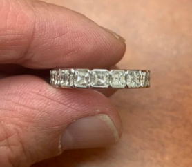 Gregchang35 posted this beautiful asscher semi-bezel eternity ring on the Show Me the Bling forum at PriceScope.  This ring has such a great look, a gorgeous eternity that truly features the stones!