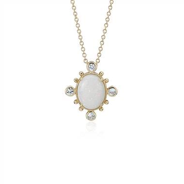 <center>Sunburst opal and white sapphire pendant set in 14K yellow gold at Blue Nile</center>