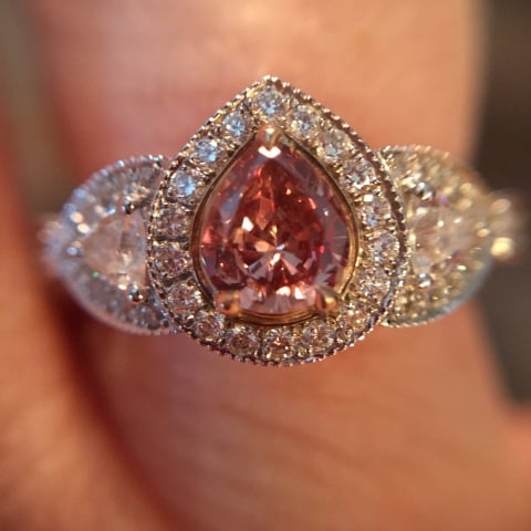 StarWarsChick originally posted her Pink Pear Diamond in a Halo Ring on the Show Me the Bling forum at PriceScope.  Isn’t this stunning? It’s a custom ring from Leibish, made it incorporate her pretty pink pear diamond and adds some nods to her beloved doggie too!