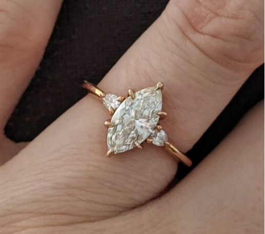 Sadler91 posted this stunning marquise engagement ring upgrade the Show Me the Bling forum at PriceScope. This diamond is stunning and the chevron rings that Sadler91 found to accompany this ring are an impeccable match.