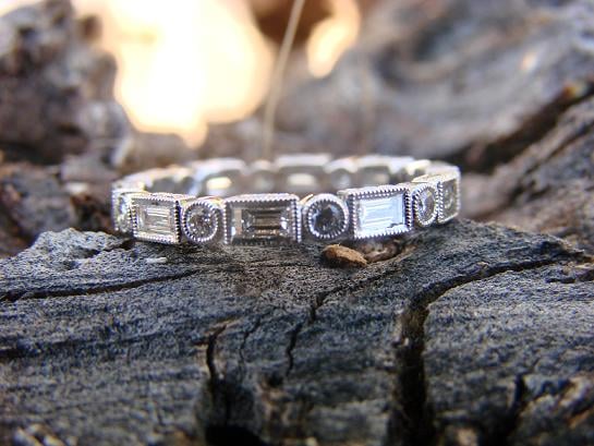 BrownEyedCountryGirl originally posted this gorgeous Beverley K. ring on the Show Me the Bling forum at PriceScope. This band is marvelous, the sparkle level is fabulous! What is your favorite pic, can you even pick just one?