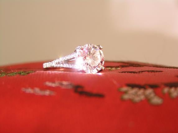 Mpc originally posted this stunning round brilliant engagement ring on the Show Me the Bling forum at PriceScope. This ring took my breath away, it is delicate and feminine while but looks secure and substantial! What is your favorite part?