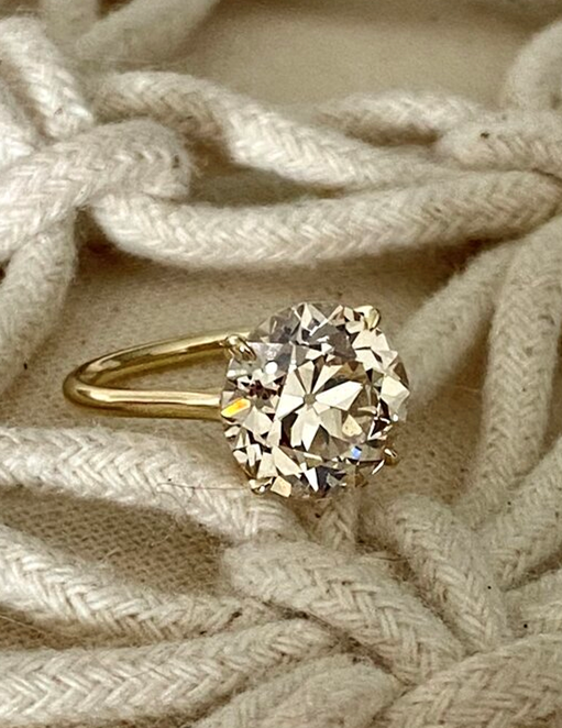 Shesastunnah posted this incredible OEC engagement ring on the Show Me the Bling forum at PriceScope!  This eye candy is delish, just a hint of light brown in this big glorious diamond! Shesastunnah is looking for help with a name for this beauty, what do you suggest?