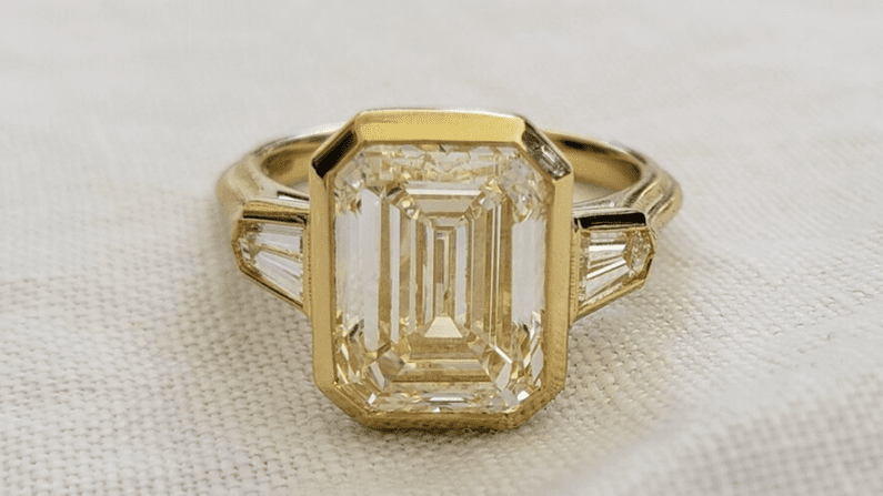 Mrs-b posted her exquisite Emerald Cut diamond ring on the Show Me the Bling forum at PriceScope.  Mrs-b had a milestone birthday and it was a doozy, but her still being here is worthy of massive celebration! Happy birthday, Mrs-b and congratulations on this magnificent ring. What bling is on your birthday wishlist?